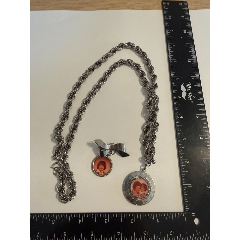 Vintage Silver Tone Spinning Photo Locket Rope Chain Necklace and Bow Brooch Set